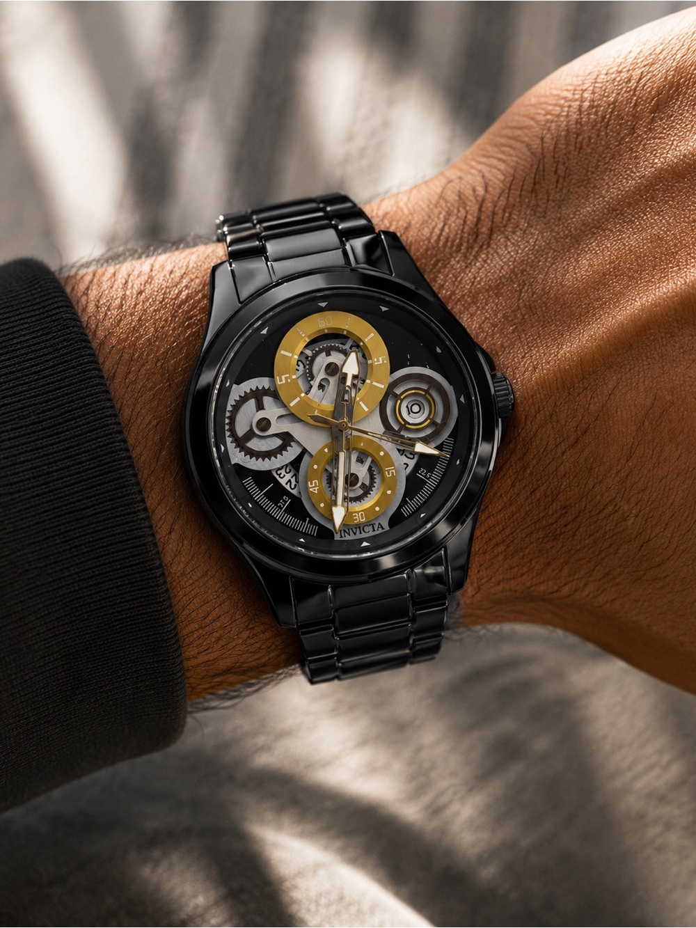 Invicta Black Watch with Gold Skeleton Accents